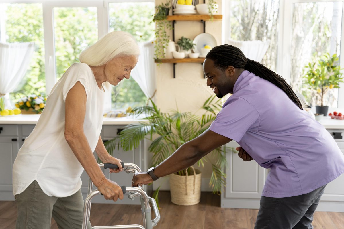 male-social-worker-taking-care-old-woman-1200x800.jpg