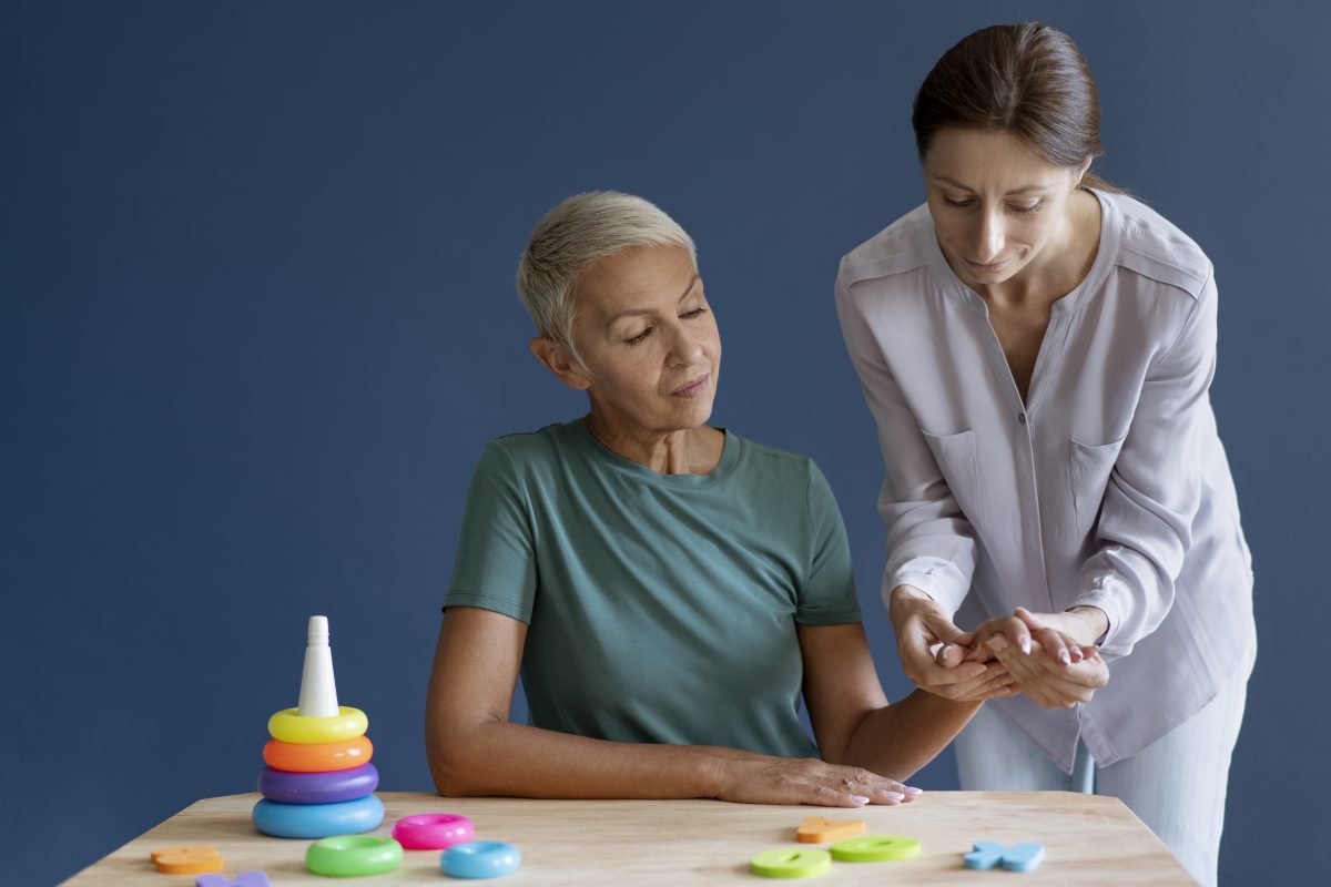 woman-doing-occupational-therapy-session-with-psychologist-1200x800.jpg